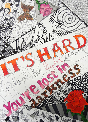 Students use colored pencil techniques to create a Safe City poster.