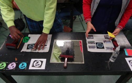 The process of making prints for buttons.