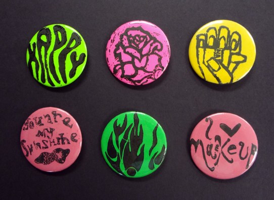 Turning prints into buttons is a great fundraiser and a fun way to teach Contrast.