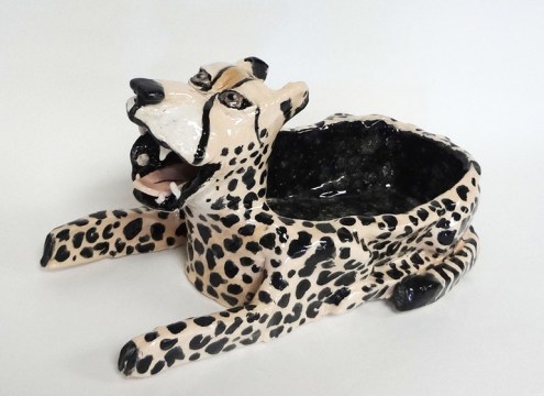 Create a cup or bowl using coil-building, then attach animal features. Functional and unique!