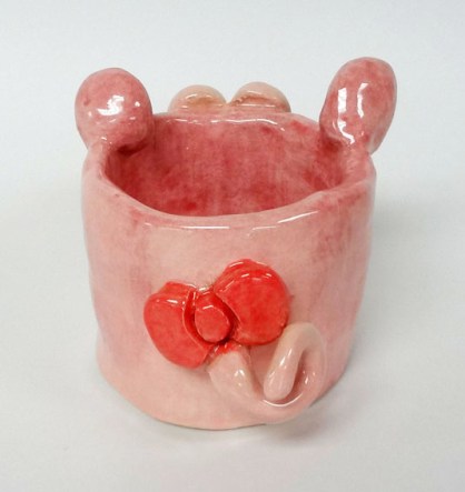 Create a cup or bowl using coil-building, then attach animal features. Functional and unique!