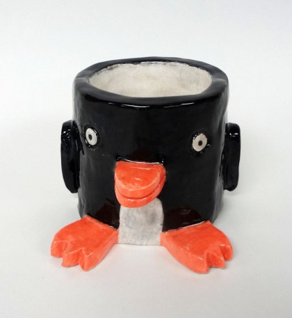 Create a cup or bowl using coil-building, then attach animal features. Functional and unique!