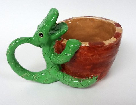 Create a cup or bowl using coil-building, then attach animal features. Functional and unique!