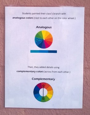 Elementary students used color theory to paint branches as a collaborative project.