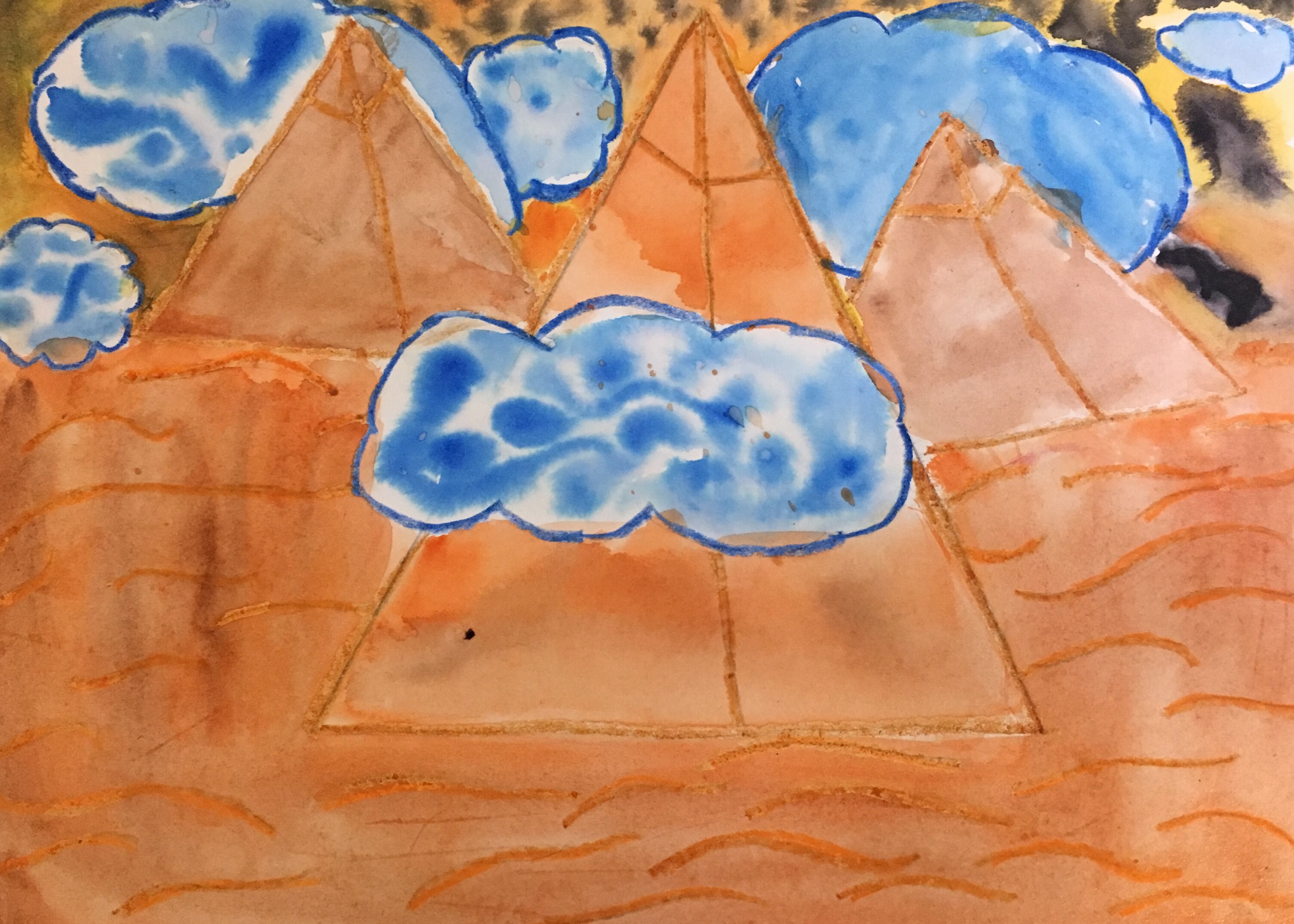 Students are inspired by James Rizzi to create wax resist landscapes or cityscapes.