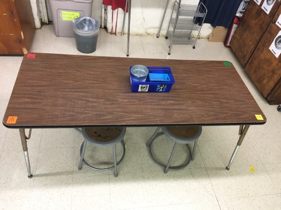 Color-coded seats provide a flexible way to assign jobs in art class.