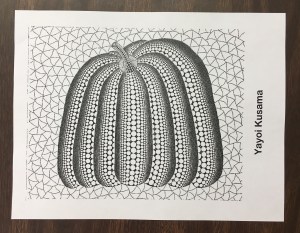 Students learn art history through a coloring center that uses artwork from an artist their table is named after.