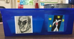 Students learn art history through a coloring center that uses artwork from an artist their table is named after.