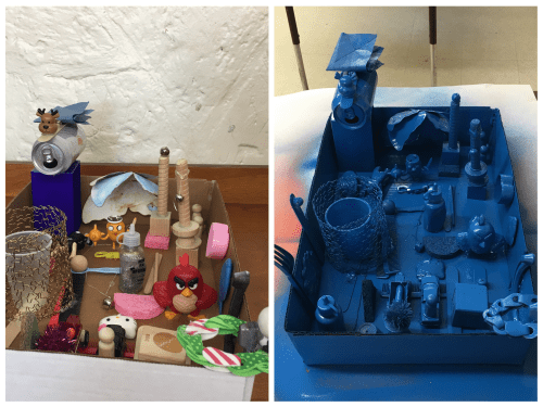 Create a Found Object Sculpture using small objects, a box lid, hot glue and spray paint.