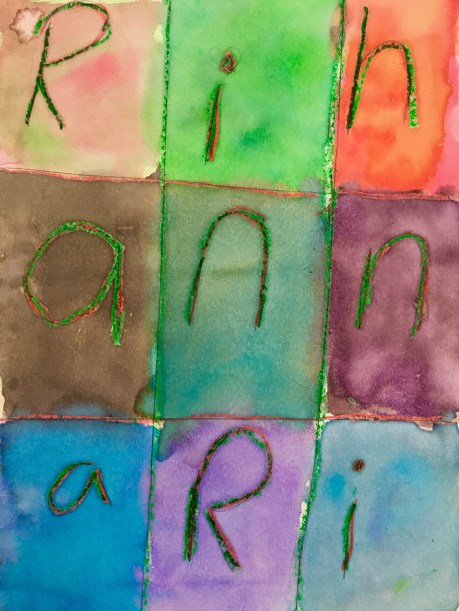Draw a grid with crayon and fill it with letters. Paint over it with watercolors to create a wax resist.