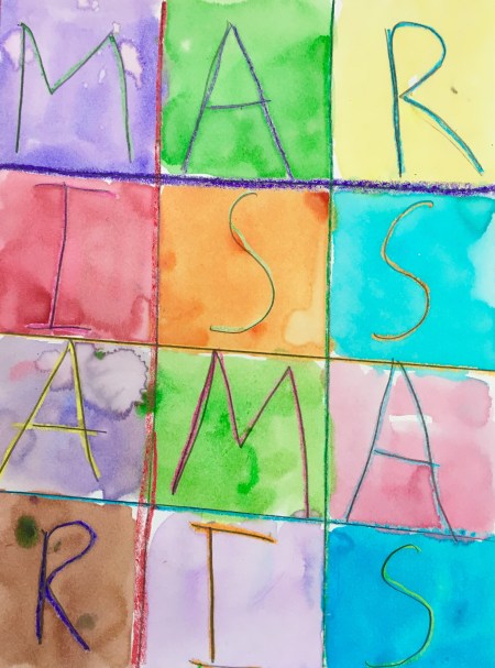 Draw a grid with crayon and fill it with letters. Paint over it with watercolors to create a wax resist.